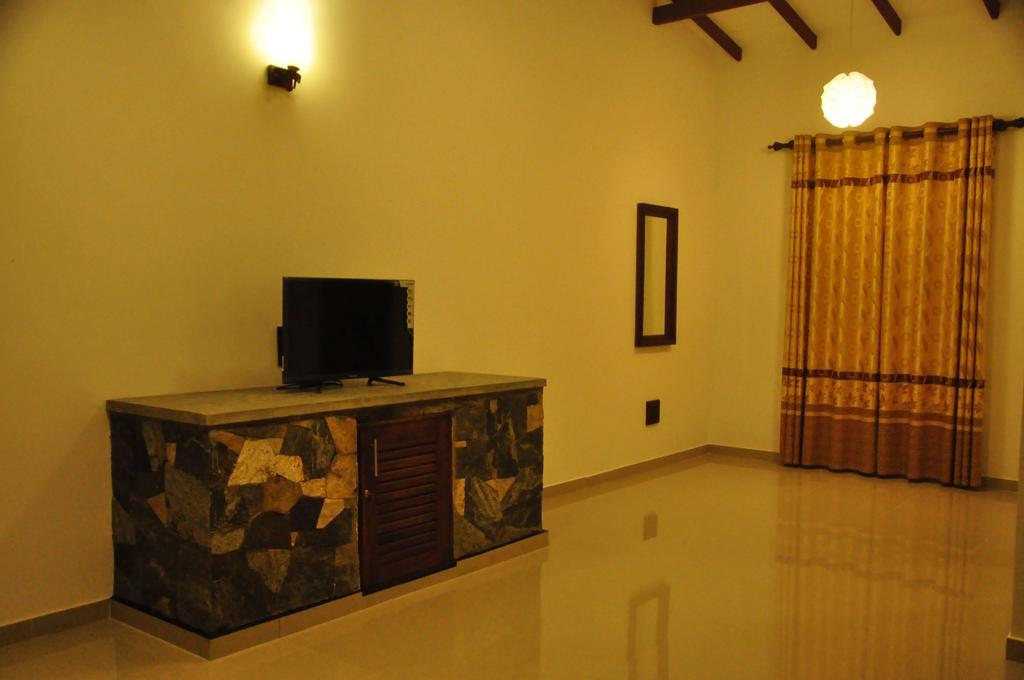 Asantha Guest House ウナワトゥナ 部屋 写真